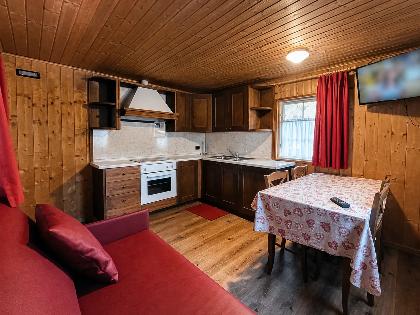 Living room inside a wooden chalet